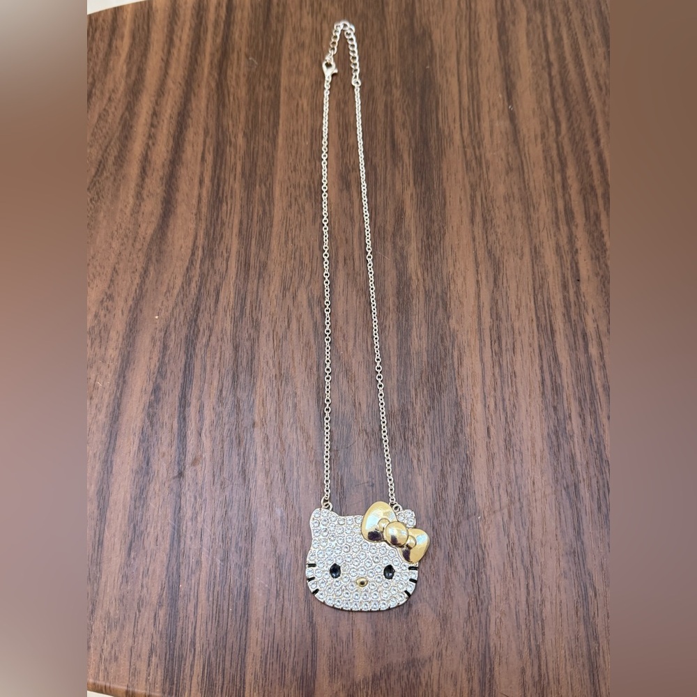 Hello Kitty Sanrio Pave Silver Crystal Necklace With A Gold Tone Bow And Nose - Picture 2 of 4